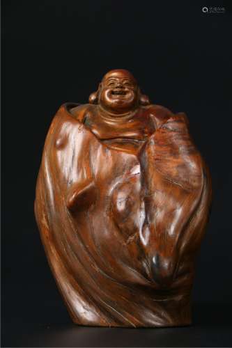 A CEDARWOOD CARVED  MAITREYA BUDDHA STATUE