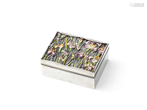 An enamelled silver rectangular box with en-suite cover Show...