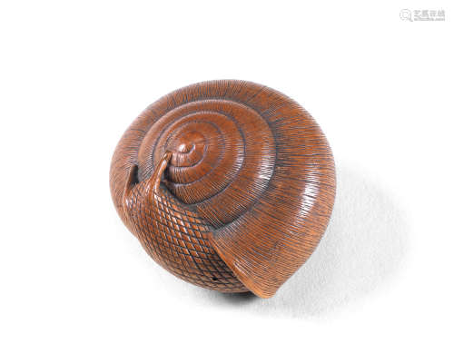 A wood netsuke of a snail By Tadayuki, Nagoya, Edo period (1...