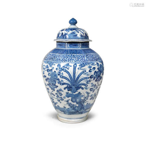 A large Arita blue-and-white octagonal jar with en-suite cov...