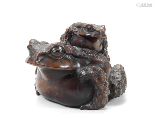 A large wood okimono of a toad and young By Masanao, Ise, Ya...