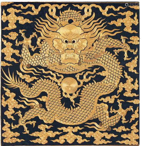 AN EXTREMELY RARE EMBROIDERED SILK BLUE-GROUND 'DRAGON' RANK...