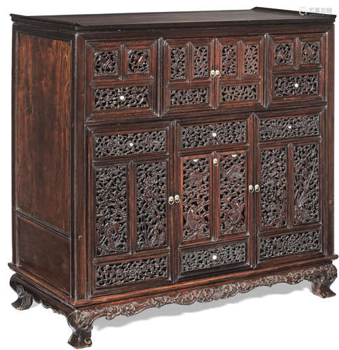 A MIXED HARDWOOD RETICULATED CABINET Mid Qing Dynasty and la...