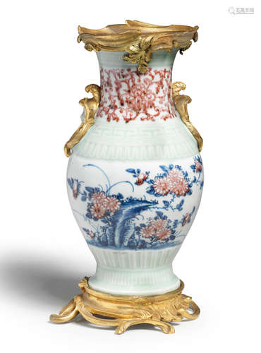 A CELADON, UNDERGLAZE BLUE AND COPPER-RED VASE Qianlong four...