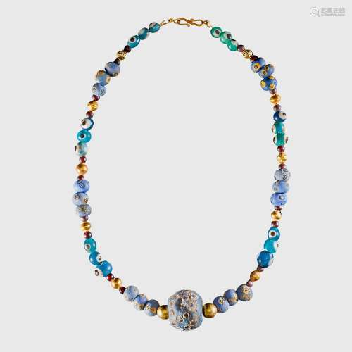 PHOENICIAN EYE GLASS AND GOLD BEAD NECKLACE NEAR EAST, C. 7T...