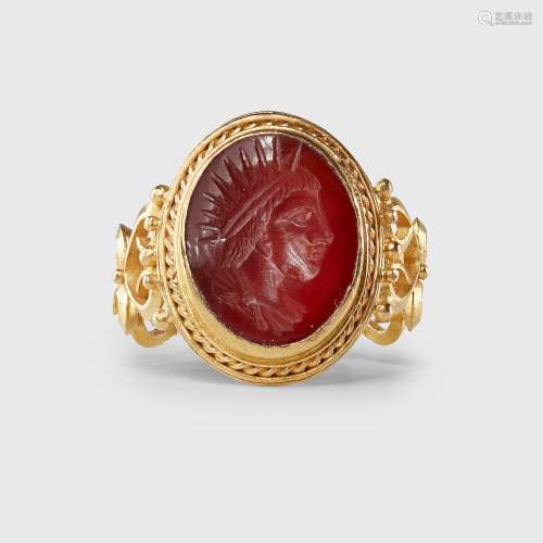 ROMAN GOLD AND CARNELIAN FINGER RING EUROPE, MID 3RD CENTURY...