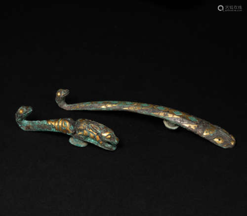 inlaid gold and silver belt hook in Han Dynasty
