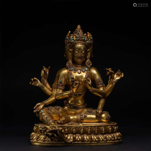 A gilt bronze six-arm Guanyin statue in the Qing Dynasty