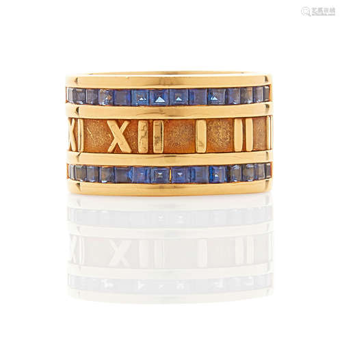 TIFFANY & CO: 18K GOLD AND SAPPHIRE 'ATLAS' BAND RING, ITALY...