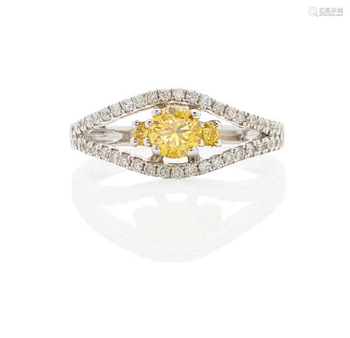 18K WHITE GOLD, FANCY VIVID YELLOW DIAMOND AND DIAMOND RING