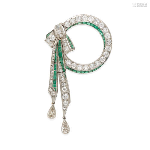 PLATINUM, DIAMOND AND EMERALD CIRCLE BROOCH