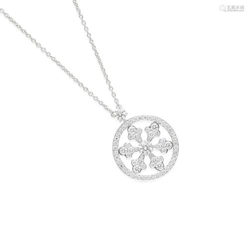 GRAFF: 18K WHITE GOLD AND DIAMOND SNOWFLAKE PENDANT NECKLACE...