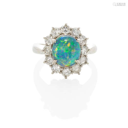 PLATINUM, BLACK OPAL AND DIAMOND HALO RING