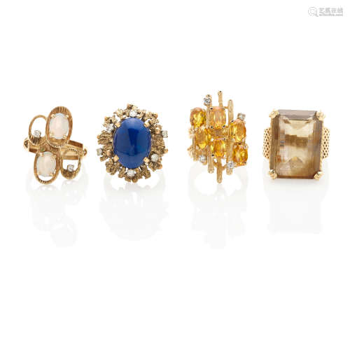 FOUR GOLD AND GEM-SET RINGS