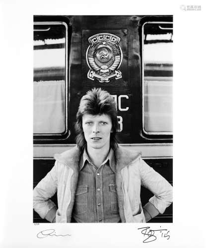 Geoff MacCormack (English, b.1947): David Bowie in front of ...