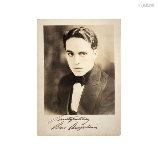 Charles Chaplin: An early signed publicity photograph, circa...