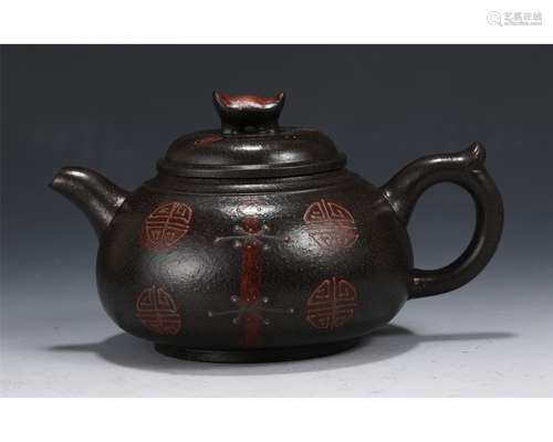 A Yixing Glazed Teapot