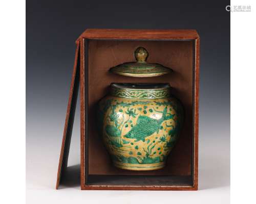 A Yellow Ground Green Enameled Porcelain Jar And Cover