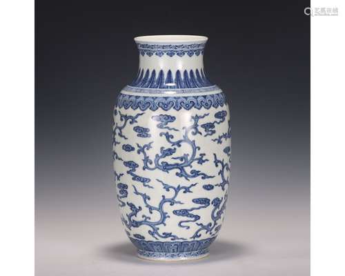 A Blue And White Dragon and Cloud Vase