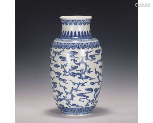A Blue And White Dragon and Cloud Vase