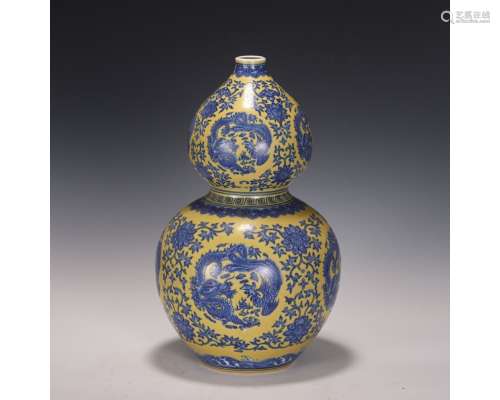A Yellow Ground and Underglaze Blue Double-Gourds Vase