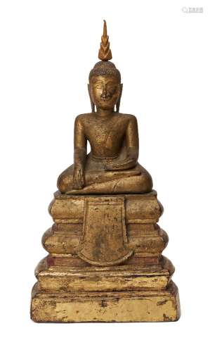 A Cambodian gilded wood seated Buddha, 19th century, 31cm hi...