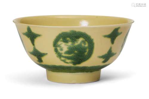 A Chinese porcelain yellow-ground green-enamelled 'dragon me...