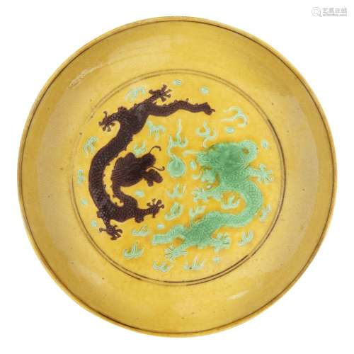 A Chinese imperial porcelain saucer dish, Tongzhi mark and o...