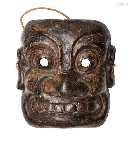 A Japanese mingei wood mask, Meiji period, carved as an Oni ...