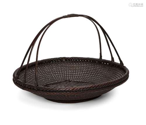 A Japanese bamboo basket by Hayakawa Shokosai I, Japanese 18...