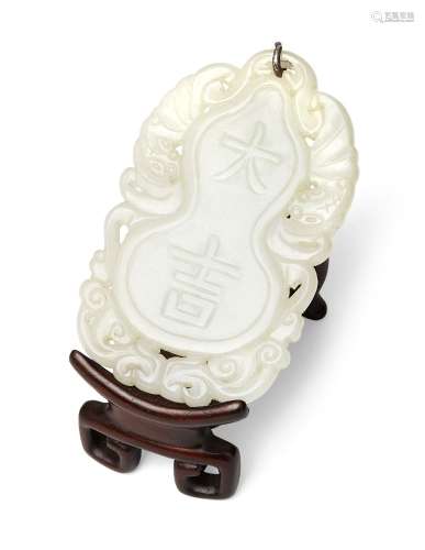 Property of a Gentleman (lots 36-85) A Chinese white jade do...