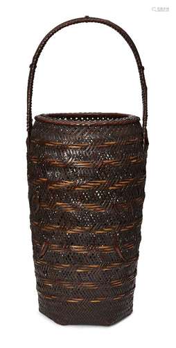 A Japanese tall Ikebana basket, early 20th century, of tubul...