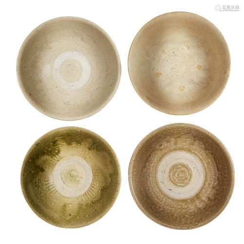 Four Annamese pottery bowls, 14th-15th century, two with cel...