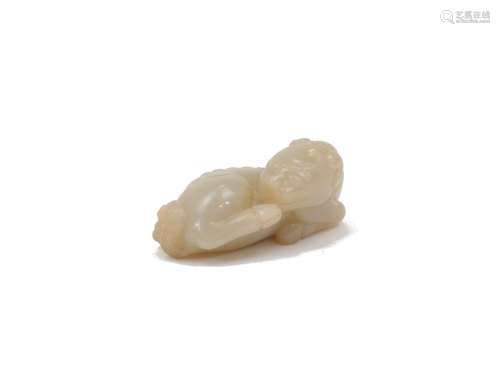 A Chinese green jade carving, 20th century, carved as a recu...