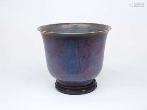 A Jun ware planter, the bowl with flaring rim and drainage h...