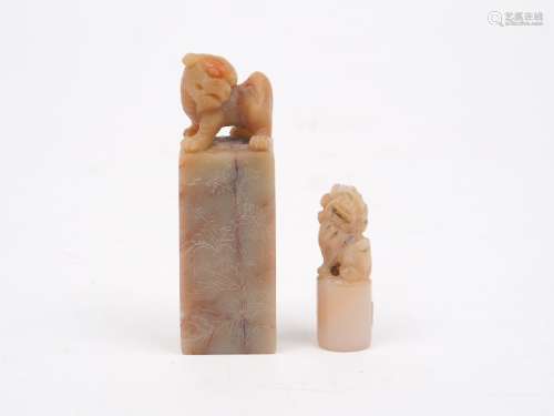 Two Chinese soapstone seals, 20th century, one carved as a m...