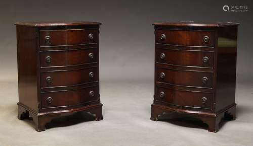 A pair of George III style mahogany serpentine chests, late ...