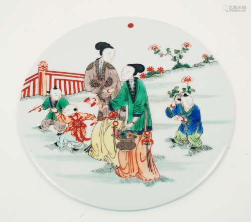 A Chinese porcelain circular plaque, Republic period, painte...