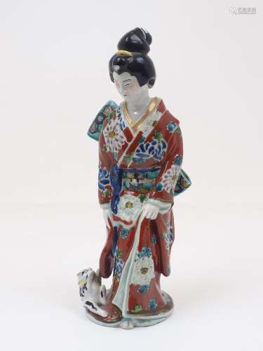A Japanese porcelain figure of a geisha, late 19th/early 20t...