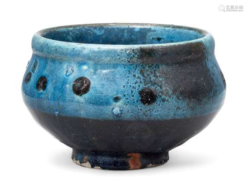 A Fahua-style stoneware jar, of compressed globular form on ...