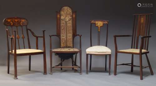 An Art Nouveau mahogany and inlaid armchair, the slatted bac...