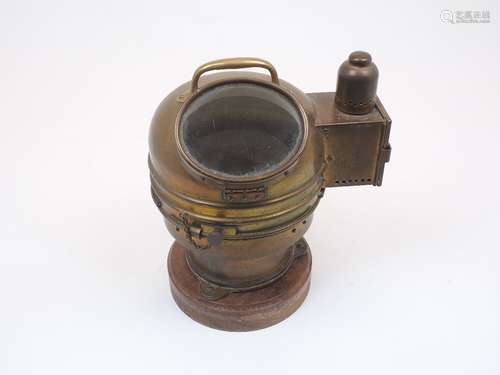 A brass cased ship's compass with candle box and binnacle, 2...