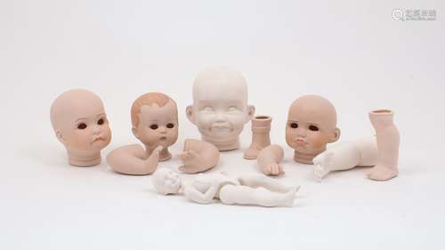 A collection of ceramic and composite doll parts, late 20th ...