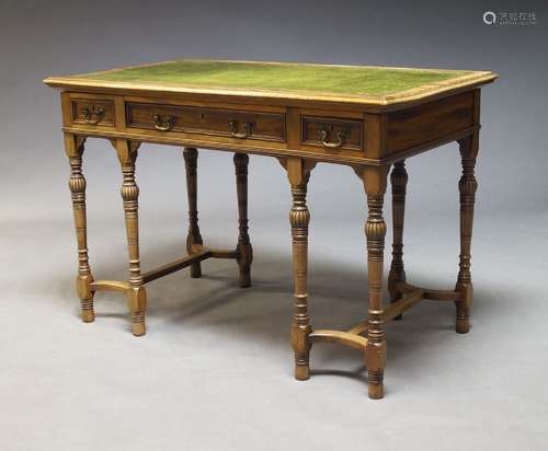 An Edwardian mahogany desk, the rectangular top inset with g...