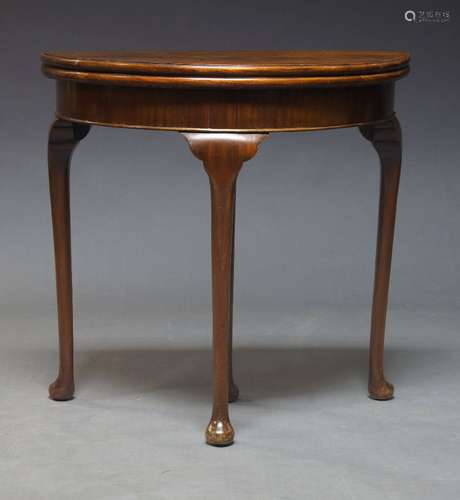 A Queen Anne style mahogany demi-lune card table, late 20th ...