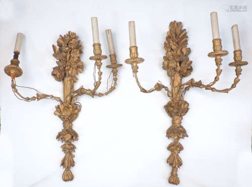 A pair of gold painted wood and gesso three-light wall appli...