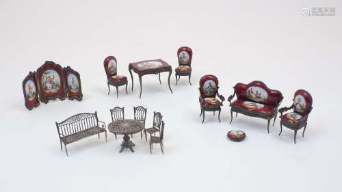 A suite of Viennese white metal filigree miniature furniture...