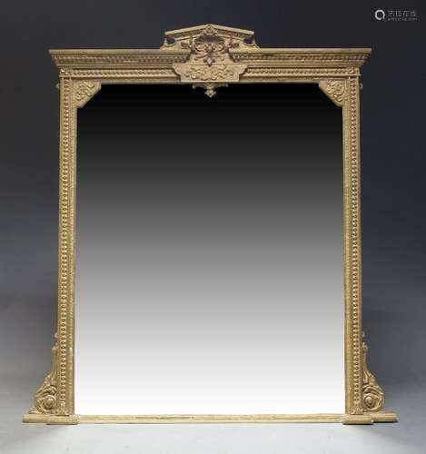 A large gilt overmantle mirror, late 19th Century, of rectan...