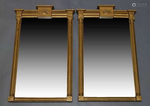 A pair of gilt wall mirrors, early 20th Century, of rectangu...