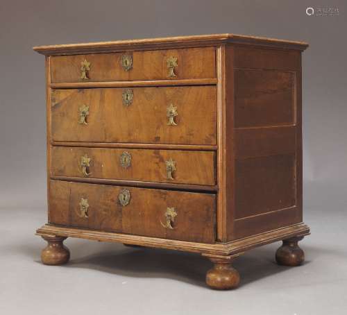 An oak chest of drawers, early 18th century and later, with ...